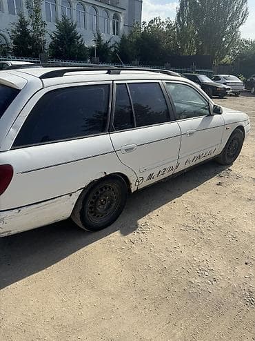 шагыл сокулук: Mazda 626: 2000 г., 2 л, Кол менен иштөөчү, Газ, Универсал — 5