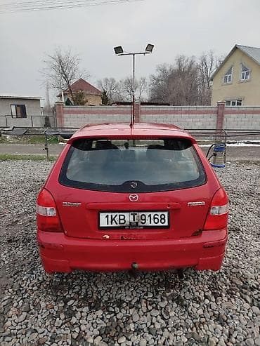 камаз аксессуары: Mazda Familia: 1998 г., 1.6 л, Ручные, Бензин, Универсал — 5