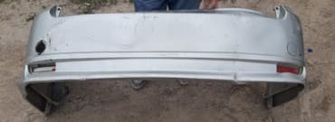 Бампер 
Тайота Ипсун 2002
задний бампер с юбкой