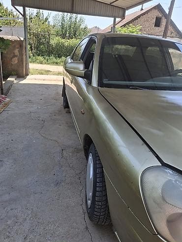 Унаа: Daewoo Nubira: 2000 г., 1.5 л, Кол менен иштөөчү, Бензин, Седан — 3