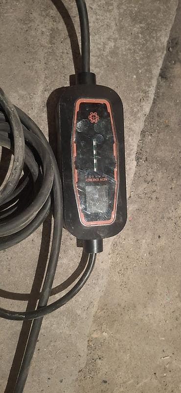 Переносное зарядное устройство для электромобиля (портативная EVSE) -