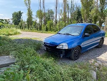 Reliant: Kia Rio: 2003 г., Кол менен иштөөчү, Бензин, Седан — 2