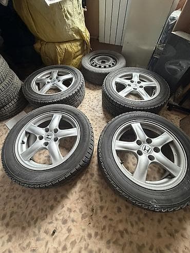 зимний балон фит: Комплект колес Honda на литых дисках с зимними шинами Yokohama — 1