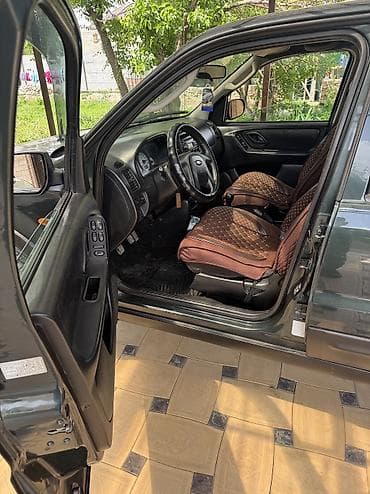 манипулятор водитель: Ford Maverick: 2004 г., 2 л, Механика, Бензин, Кроссовер — 9