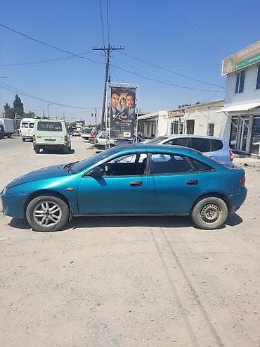 mini cooper: Mazda 323: 1995 г., Хэтчбэк — 3