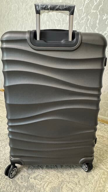 цена чемодана на колесах: Чемодан, Новый, Большой (более 70 л), Водонепроницаемость, Вращающиеся колеса на 360°, Кодовый замок — 3