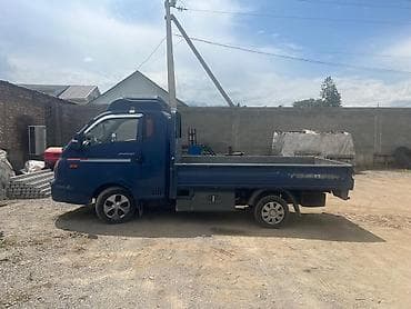 рулевой насос портер 1: Hyundai Porter II — малотоннажный бортовой грузовик синего цвета — 2