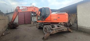 мини кран манипулятор: Экскаватор, Doosan, 2012 г., Колесный — 4