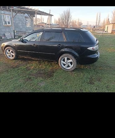 вакум газ 53: Mazda 6: 2003 г., 2 л, Механика, Бензин, Универсал — 1