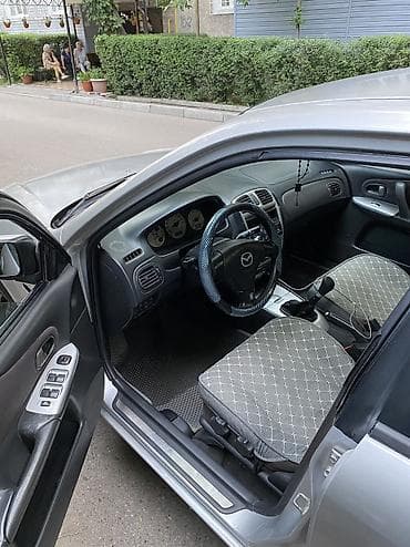 mazda 323 bj: Mazda 323: 2002 г., 1.6 л, Механика, Бензин, Хэтчбэк — 7