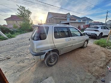 такта раум: Toyota Raum: 1999 г., 1.5 л, Автомат — 1