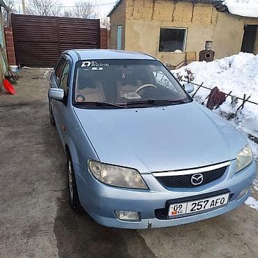 универсал мазда: Mazda 323: 2003 г., Универсал — 3