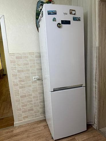 nintendo switch 1: Холодильник Beko с нижней морозильной камерой - Двухкамерная модель — 1