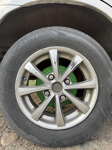 Литые диски R14 (кажется 4/100) с шинами Dunlop - Комплект колес на — 1