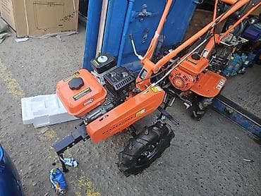 мотокоса бензиновая: Мотоблок бензиновый, оранжевый, колёсный Описание: - Бензиновый — 1