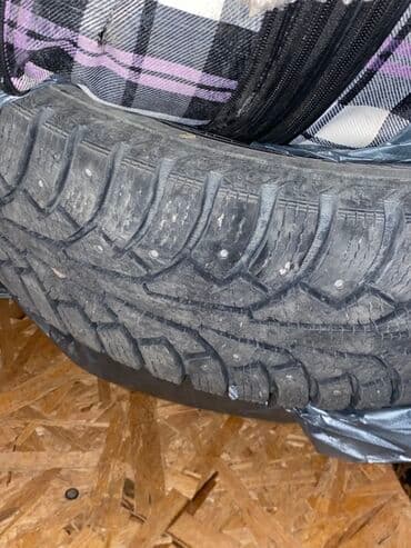 Шипованные зимние шины для легкового автомобиля. - Тип: зимние