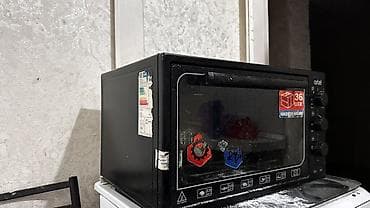 Мини‑духовка (электрическая печь) Artel, объем 36 л. Характеристики и