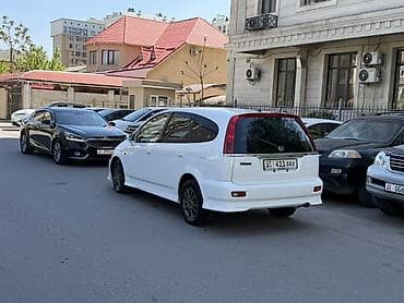 пороги на стрим: Honda Stream: 2001 г., 2 л, Автомат, Газ, Универсал — 10