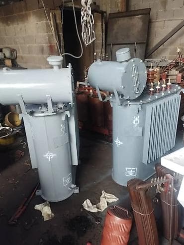 тмг: Силовой трансформатор серого цвета с расширительным баком и — 2