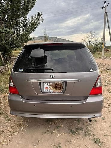 двойной выхлоп: Honda Odyssey: 2001 г., 2.3 л, Автомат, Газ, Минивэн — 2