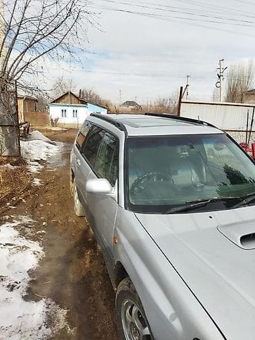 другие марки: Subaru Forester: 1997 г., Кроссовер — 2