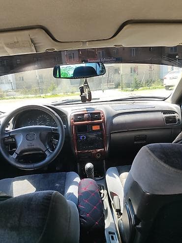 s class w220: Mazda 626: 1999 г., 1.8 л, Механика, Бензин, Хэтчбэк — 7