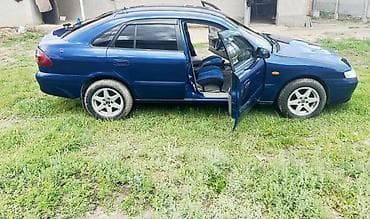 2 8: Mazda 626: 2000 г., 1.8 л, Механика, Бензин, Хэтчбэк — 7