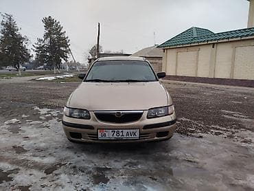 zimmer e9 pro: Mazda Capella: 1999 г., 2 л, Механика, Бензин, Седан — 1