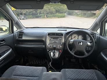 женщину: Honda Stream: 2005 г., 1.7 л, Автомат, Бензин, Минивэн — 8