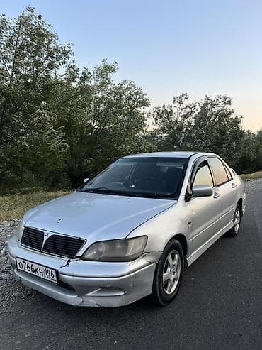 авто в такси: Mitsubishi Lancer: 2000 г., 1.5 л, Автомат, Бензин, Седан — 2