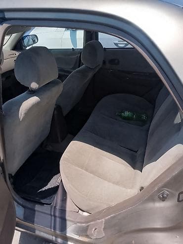 hyundai ionic: Mazda Familia: 1999 г., Автомат, Седан — 6