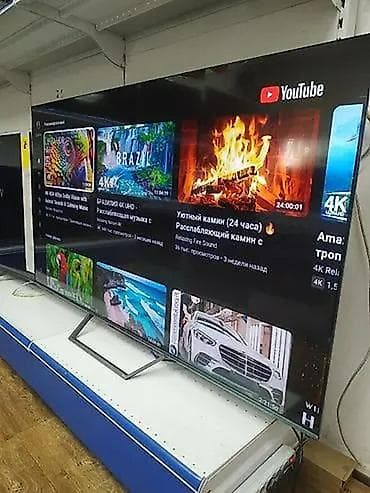 magic remote: Ультратонкий смарт‑телевизор с большим экраном (примерно 65–75") — 1