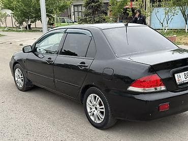 camry 2010: Mitsubishi Lancer: 2006 г., Автомат, Бензин, Седан — 5