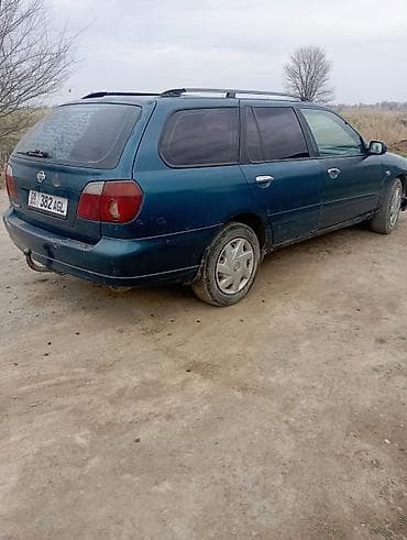 каска жилет: Nissan Primera: 2001 г., Универсал — 3