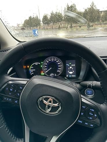 mini kuper: Toyota Corolla: 2021 г., Гибрид, Седан — 9