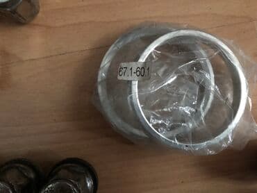 дом на кольцах: Продам новые центровочные кольца 2 шт 67.1-60.1 — 1