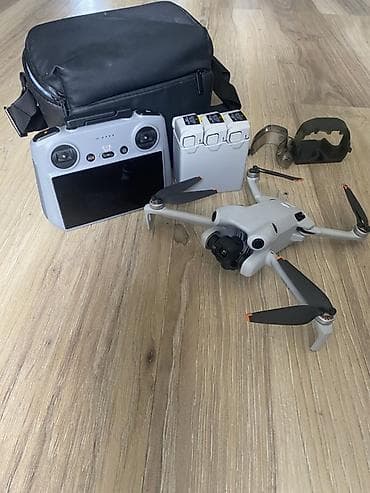 Квадрокоптер DJI Mini 4 Pro Fly More Combo с пультом DJI RC2