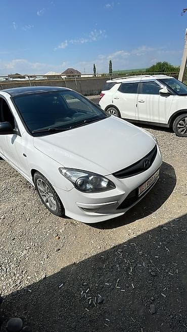 byd leopard 3: Hyundai i30: 2010 г., 1.6 л, Автомат, Бензин, Хэтчбэк — 4