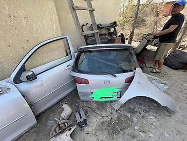 Автозапчасти: Разбор Mazda (хэтчбек, серебристый цвет) — автозапчасти б/у. В — 4