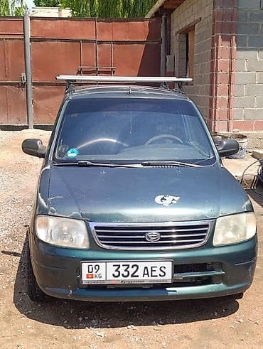авто кытай: Daihatsu Cuore: 2001 г., 0.1 л, Автомат, Бензин, Хэтчбэк — 4