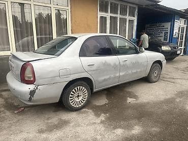 Daihatsu : 2004 г., 1.5 л, Механика, Бензин, Седан — 3