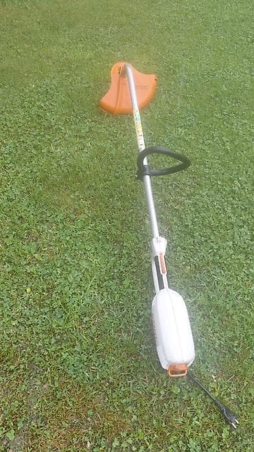 вилком: Электрический австрийский триммер STIHL FSE 71 - Сетевой триммер для — 1