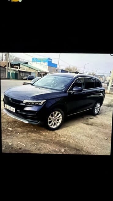 ГАЗ: Кроссовер (5 дверей) темно-синего цвета. Основные особенности: - — 1