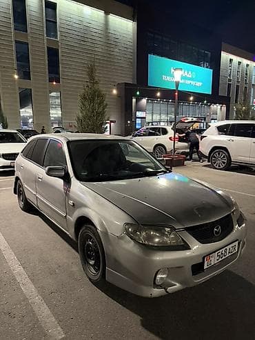 Mazda Familia: 2002 г., 1.5 л, Механика, Бензин, Универсал