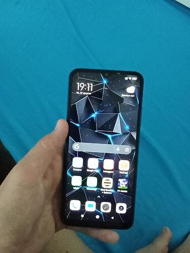 Redmi, Redmi 9A, Б/у, 64 ГБ, цвет - Голубой, 1 SIM, 2 SIM — 3