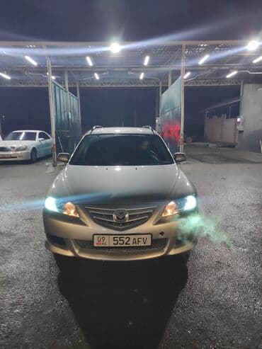 Mazda 6: 2002 г., Универсал