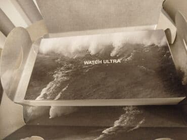 часы керамика: Смарт-часы модели Ultra в комплекте с оранжевым ремешком. Устройство — 2