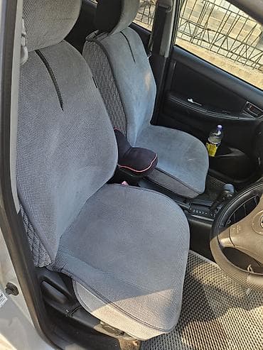 мата секыл: Toyota Corolla: 2003 г., 1.5 л, Автомат, Бензин, Хетчбек — 7