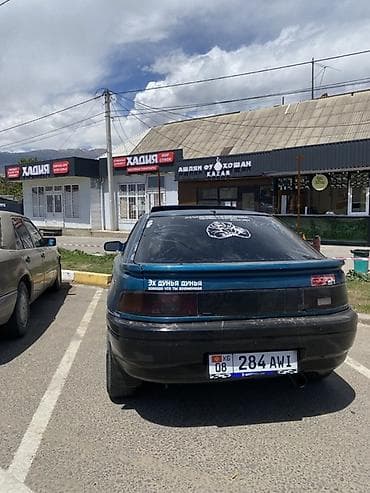 Унаа сатуу: Mazda 323: 1994 г., 1.6 л, Кол менен иштөөчү, Бензин, Хетчбек — 4