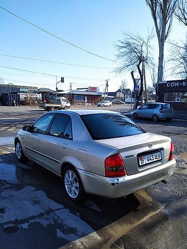 mazda 2: Mazda 323: 2000 г., 1.5 л, Механика, Бензин, Седан — 2